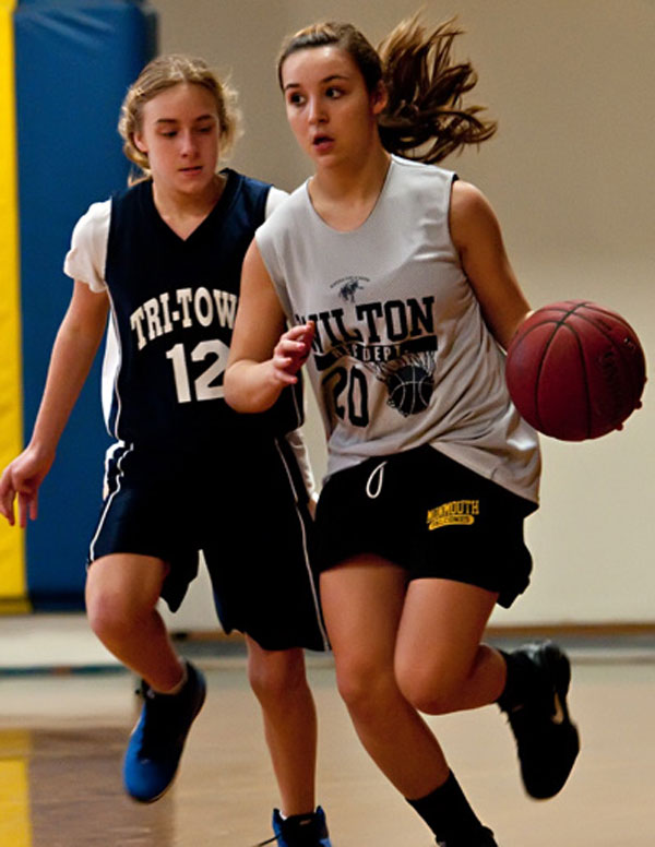 Wilton's Renee Solis (16 points) leads the fastbreak against Poland, Sunday afternoon in a Western Maine Youth Basketball League 5th and 6th grade division game. Wilton beat Poland, 56-18 to remain unbeaten in four games this season.