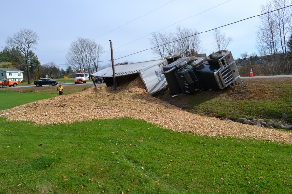 Wilson was on his way to deliver the wood chips to ReEnergy in Livermore Falls, said Wilton Police Department Sgt. Chad Abbott. The tractor trailer rolled onto its side, landing off the road and partially down a short embankment. 