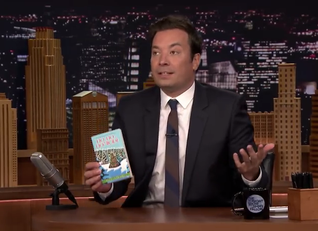 Jimmy Fallon on The Tonight Show uses local author Kathy Emerson's book Ho-Ho Homicide as part of a funny bit on 